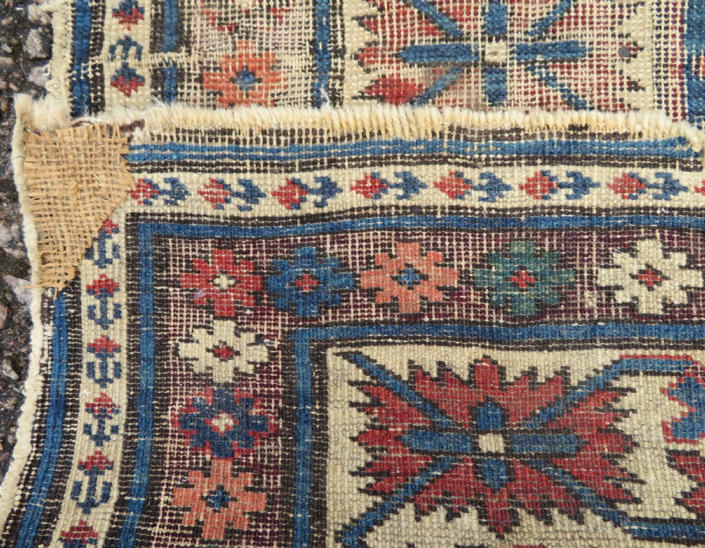 DISTRESSED ANTIQUE CAUCASIAN DAGHESTAN RUG. 135CM X 116CM View XIII