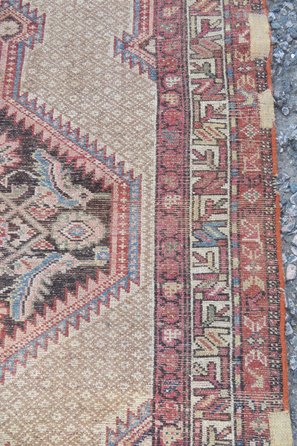 An antique hand-knotted Sarab rug with a geometric central medallion, camel hair field, and distressed terracotta borders. View XV