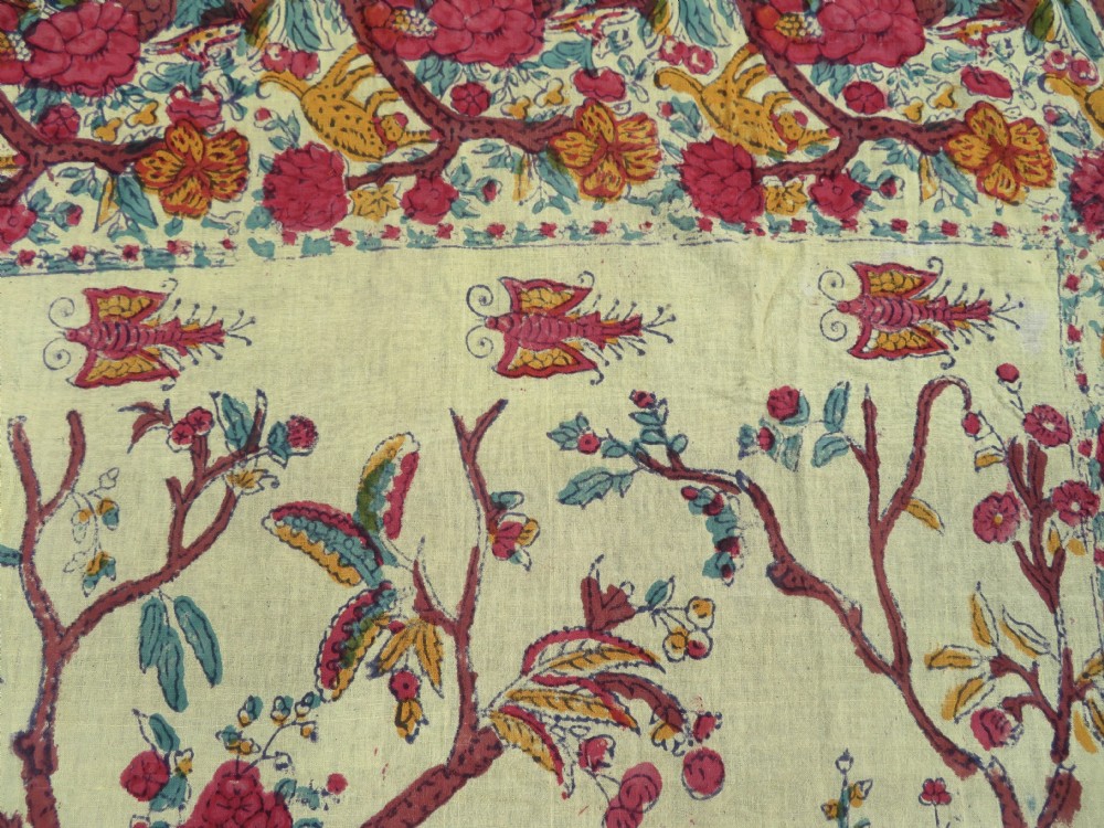 An antique 19th-century yellow cotton palampore textile featuring a centrally printed Tree of Life with birds, animals, and a pink floral border. View VII