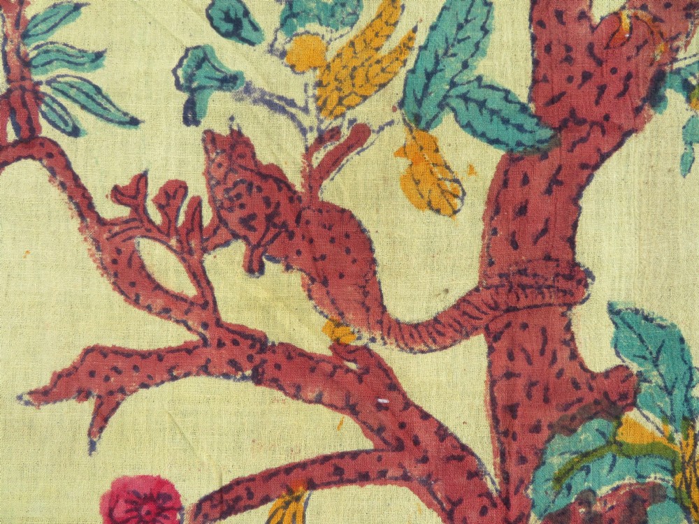 An antique 19th-century yellow cotton palampore textile featuring a centrally printed Tree of Life with birds, animals, and a pink floral border. View XI