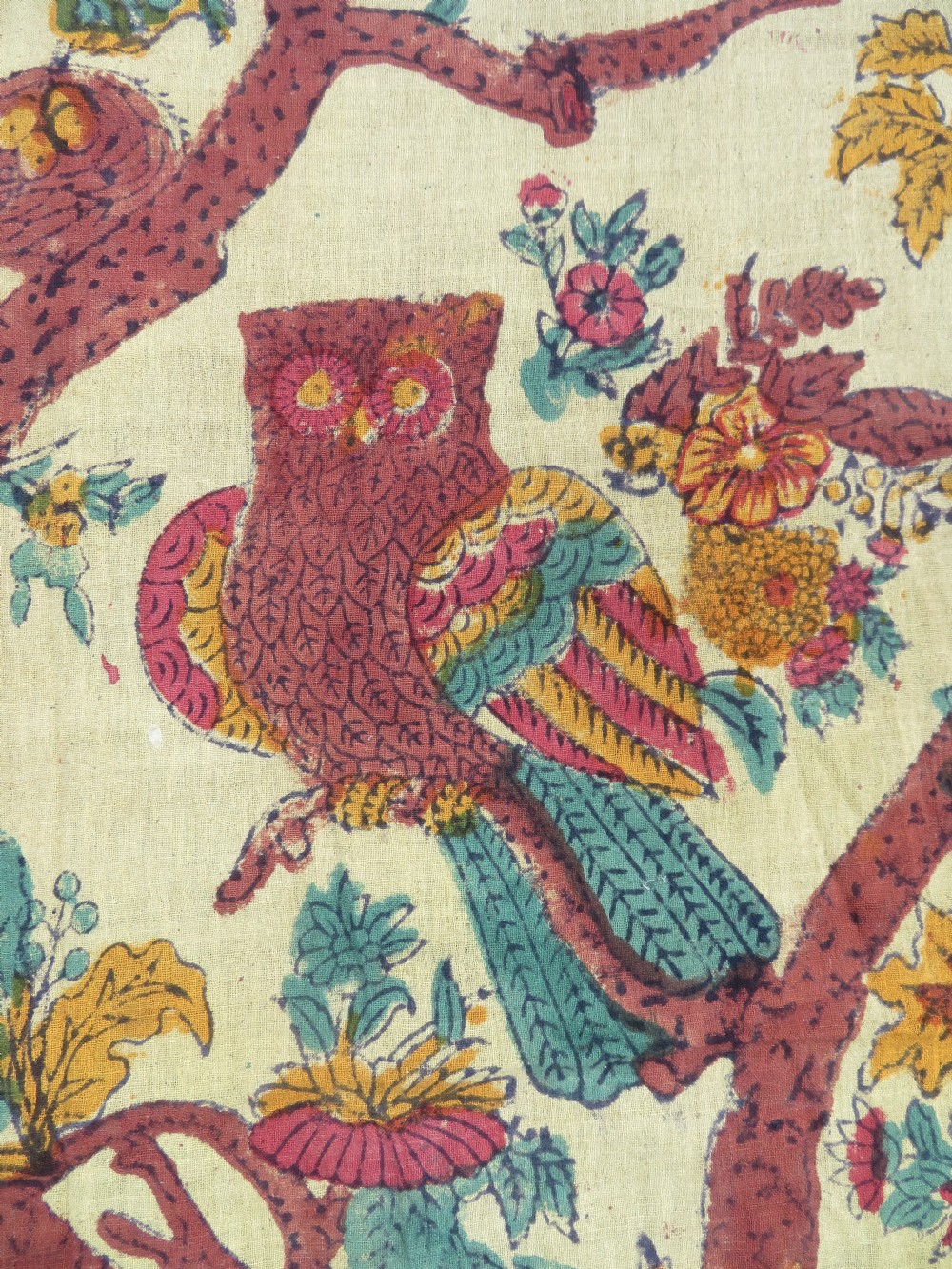 An antique 19th-century yellow cotton palampore textile featuring a centrally printed Tree of Life with birds, animals, and a pink floral border. View XII