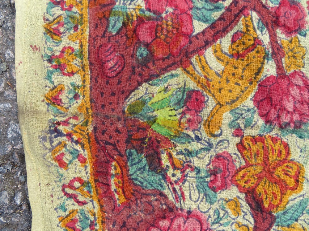 An antique 19th-century yellow cotton palampore textile featuring a centrally printed Tree of Life with birds, animals, and a pink floral border. View XIV