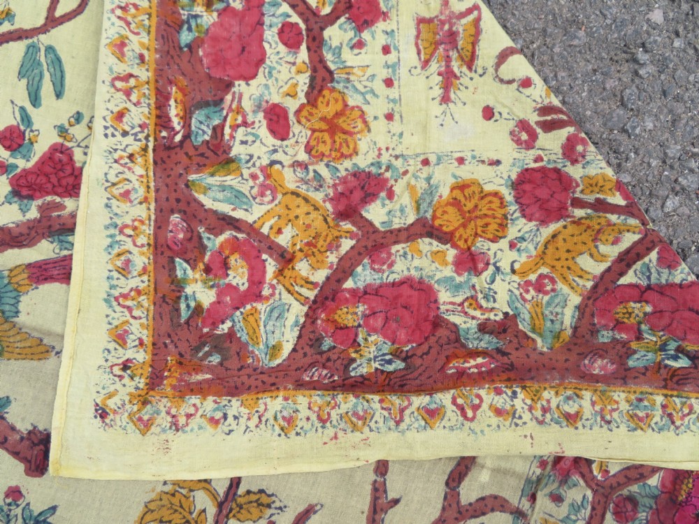 An antique 19th-century yellow cotton palampore textile featuring a centrally printed Tree of Life with birds, animals, and a pink floral border. View XVIII