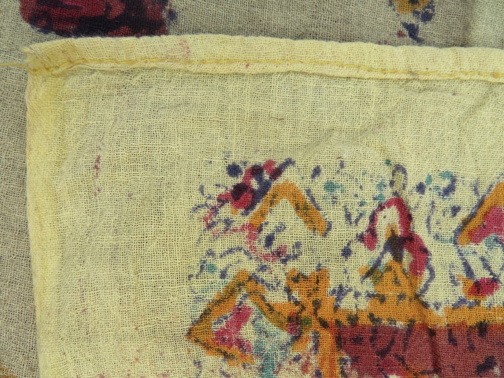 An antique 19th-century yellow cotton palampore textile featuring a centrally printed Tree of Life with birds, animals, and a pink floral border. View XIX