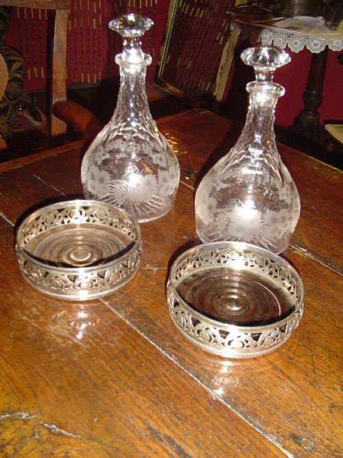 Pair of Signed Period Decanters with Coasters.