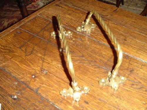 A Pair of Pew Umbrella Supports in Gothic Taste.