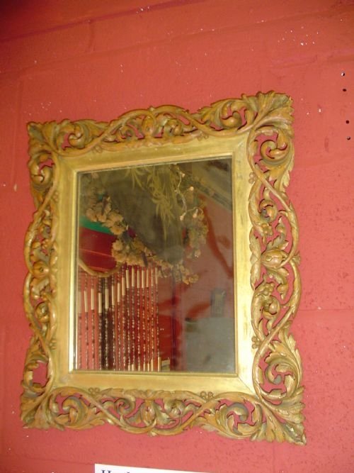 An Early 19th C. Carved Gilt Wood Framed Mirror.