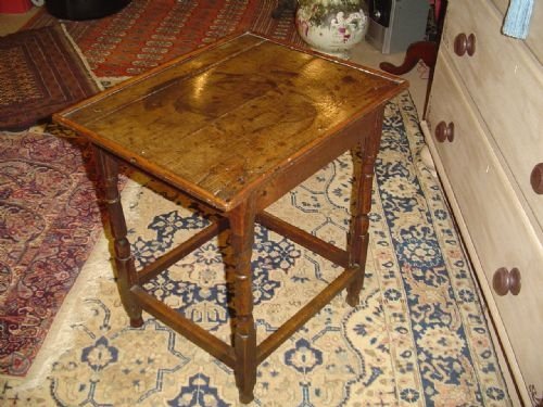 fig 1. An Early Oak Low Side Table. 17th c.