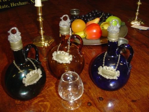 Three Georgian Coloured Glass Decanters. C1800
