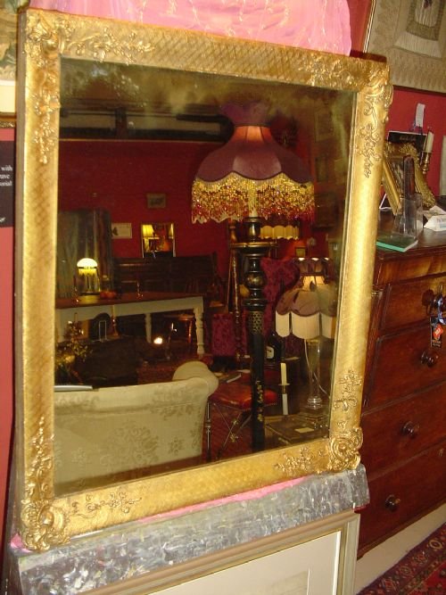 A Large 19th Century Wall Mirror in a Gilt Frame.