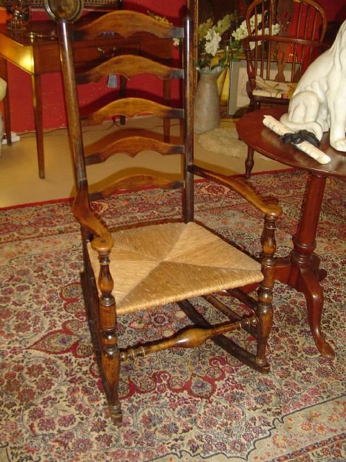 A 19th Century Ladderback Rocking Chair.