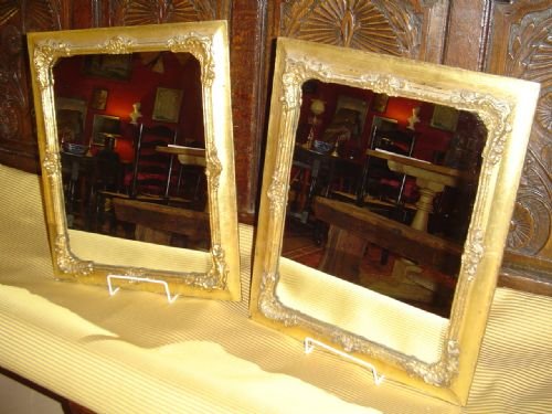 A Decorative Pair of Mirrors.
