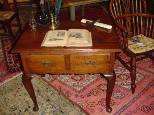 A Georgian Oak Lowboy. C.1780
