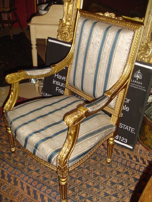 A Louis Xvi Style Giltwood Fauteuil.
