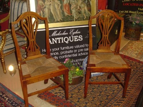 A Pair of Elm Country Chairs. C1780.