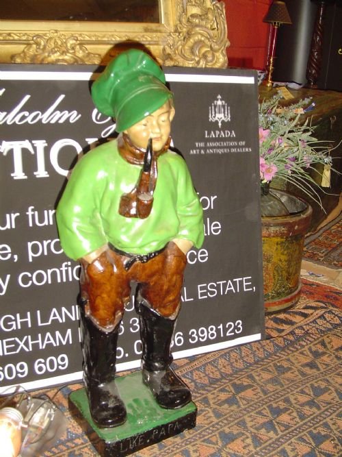 Large Model of Pipe Smoking Boy.