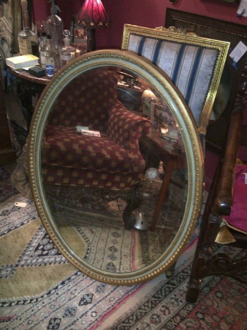 Large Oval Wall Mirror. 19th C.