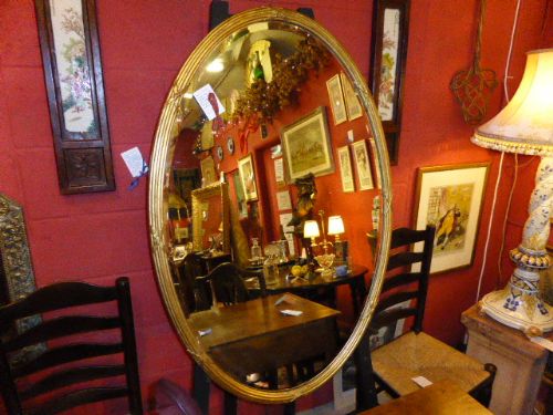 Large Oval Giltwood Mirror.  C.1820-1840