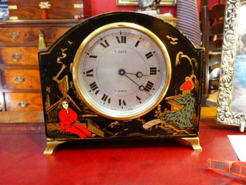 A Small 8 Day Mantel Clock in Lacquered Chinoiserie Case.