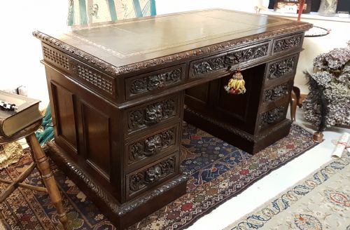 "Edwards & Roberts" Carved Oak Desk.  C.1860.