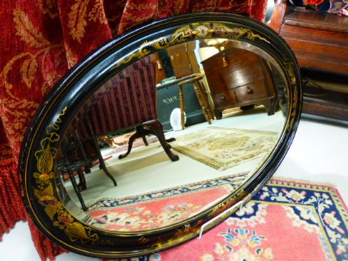 Late 19th C. Black Lacquered Oval Mirror.
