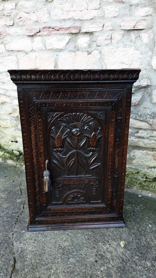 Carved Oak Wall Cupboard