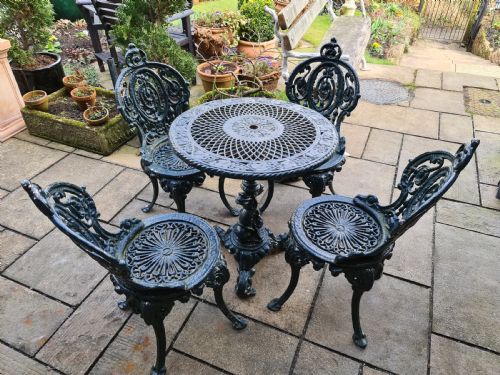 Wonderful Set of Cast Iron Garden Table and Four Chairs
