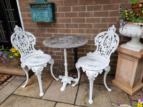 CASTIRON BISTRO TABLE UNUSUAL MARBLE TOP 2 HEAVY CASTIRON CHAIRS