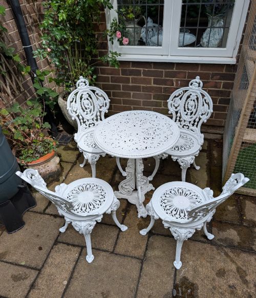 SUPERB SET OF FOUR CASTIRON GARDEN CHAIRS TOGETHER WITH RARE CHRISTOPHER DRESSER DESIGN TABLE - ADDITIONAL PHOTO 1