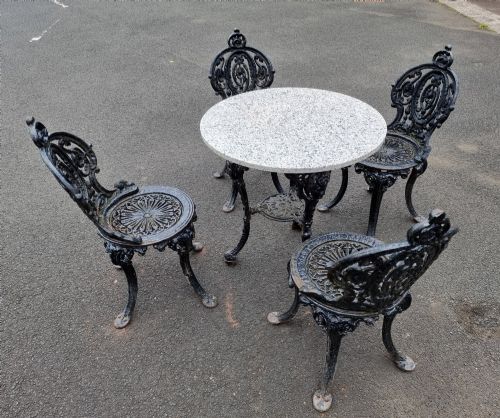HEAVY CASTIRON SET OF GARDEN TABLE AND 4 CHAIRS - ADDITIONAL PHOTO 1