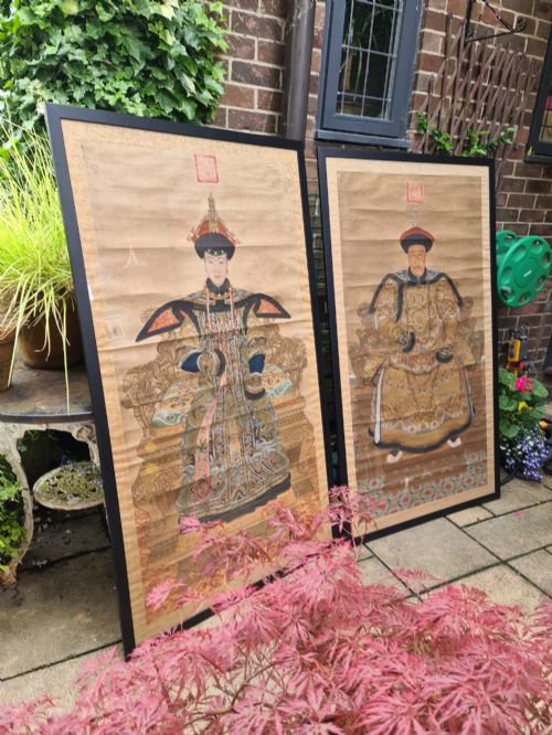 A LARGE PAIR OF FRAMED CHINESE ANCESTRAL SCROLLS