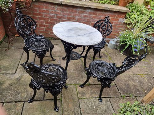 Heavy Cast-iron Set of Garden Table and Four Chairs