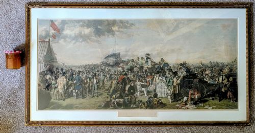 fig 1. A panoramic 19th-century framed print depicting a densely populated scene at the Epsom Derby within a cream mount and gilt wooden frame.