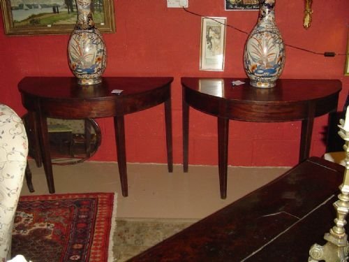A Pair of Regency Demi-lune Mahogany Side Tables