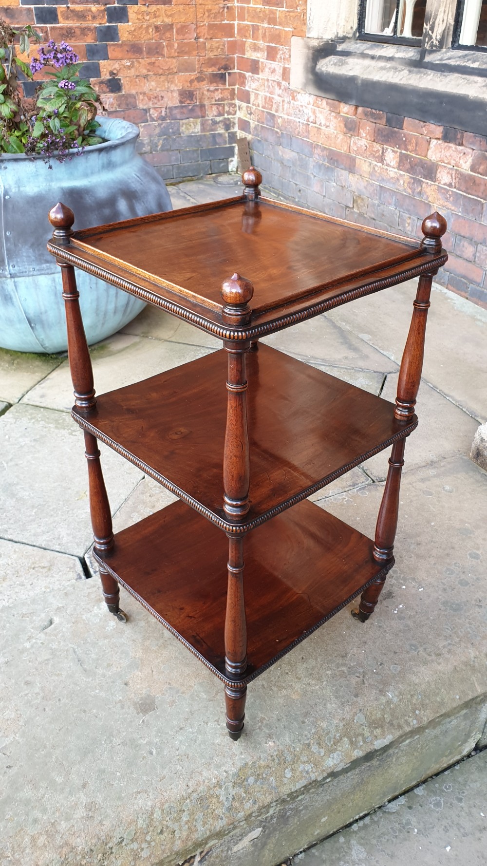 A Regency Flame Mahogany Three Tier What-Not View VII