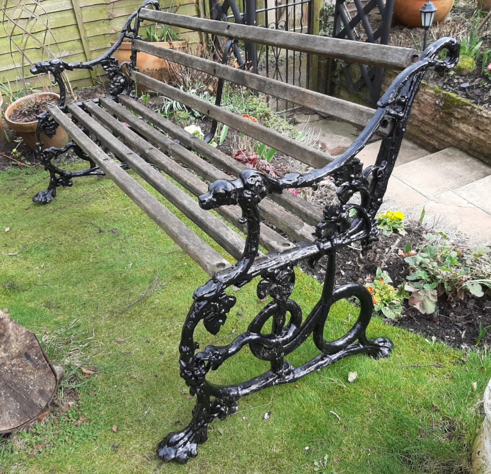 Handsome Garden Bench Dog and Serpent Pattern