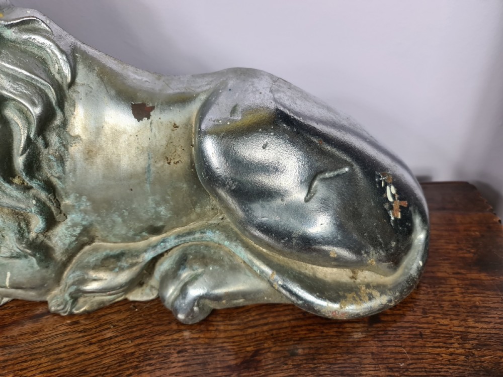 Interesting large Recumbent Lion Doorstop View IV