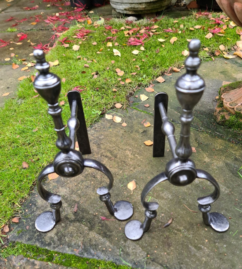 A Pair of George III Burnished Steel Fire Dogs View II