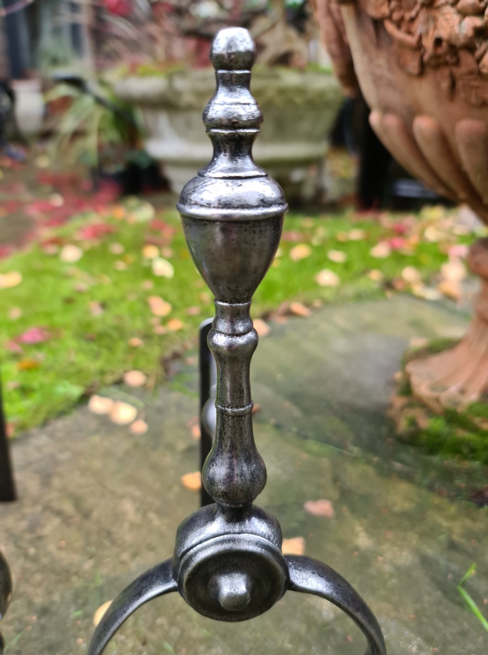 A Pair of George III Burnished Steel Fire Dogs View III