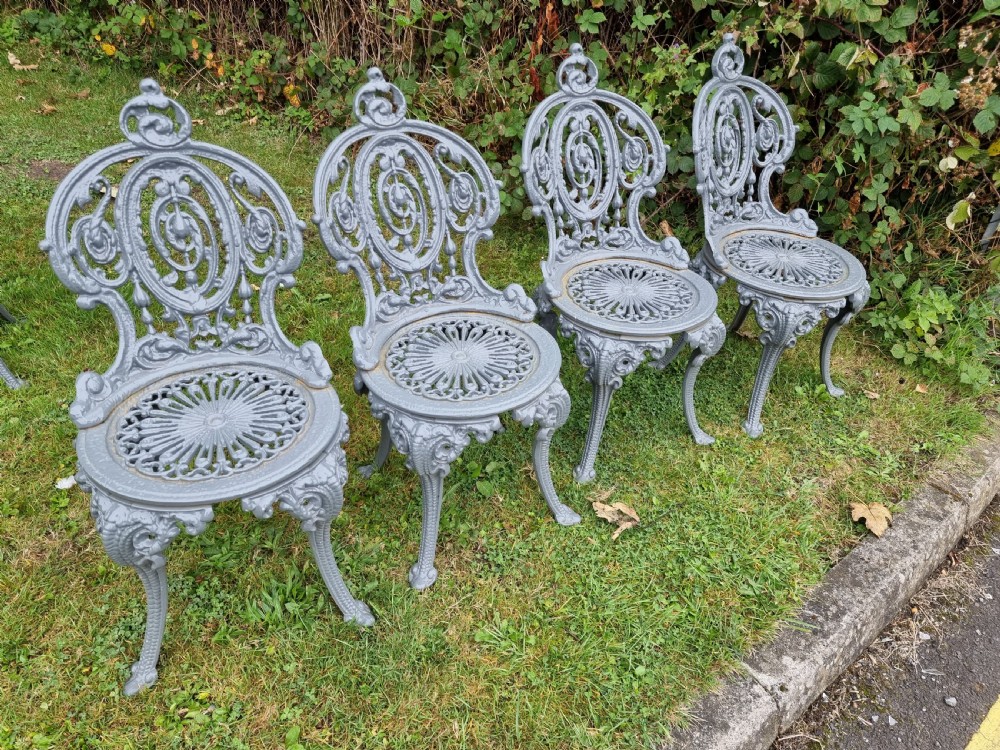 Four Traditional Heavy Cast-iron Victorian style Garden Chairs