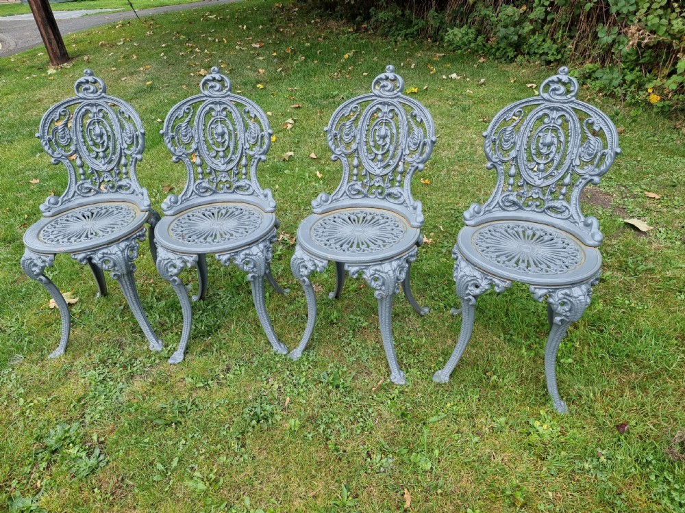 Good set of  Four Traditional Cast-iron Victorian style Garden Chairs