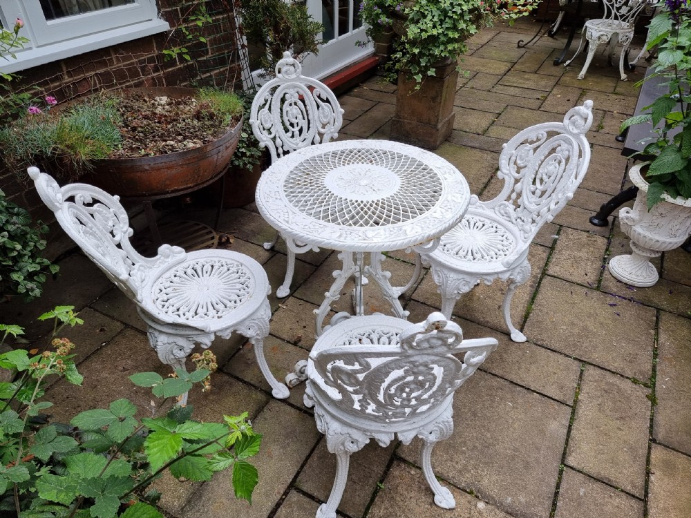 Heavy Cast-iron Set of Garden Table and Four Chairs