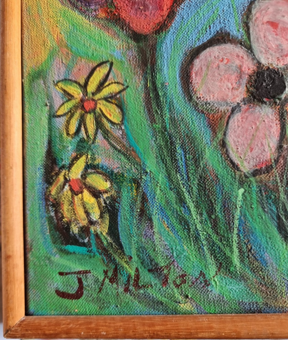 A framed mid-century oil painting on canvas featuring stylised vibrant flowers in shades of red, purple, orange, and yellow against a colourful backdrop, set within a thin wooden frame. View II