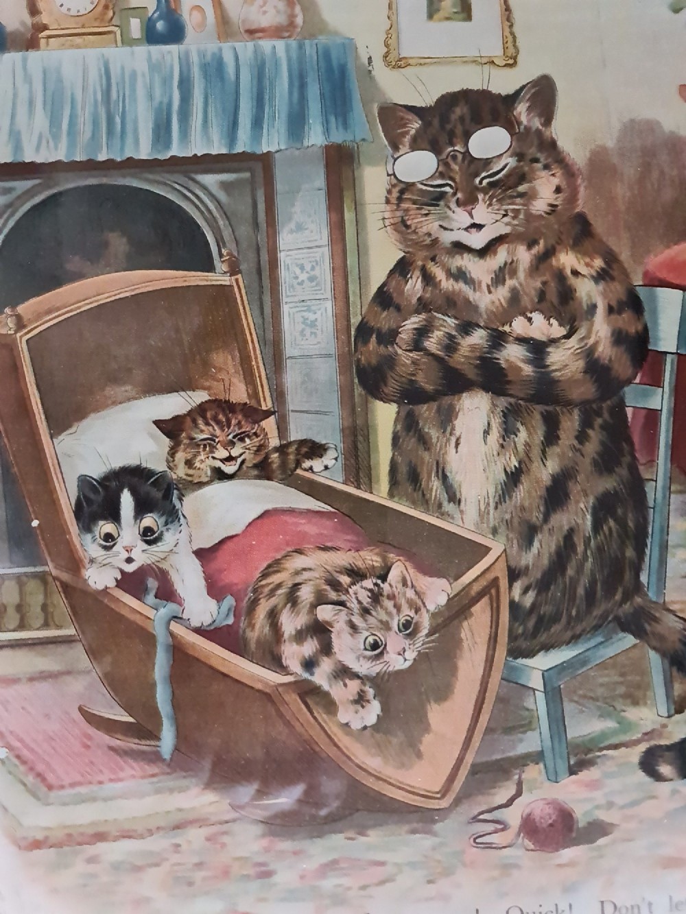 A pair of black framed antique prints depicting anthropomorphic cats in domestic interior scenes with printed text captions. View VII