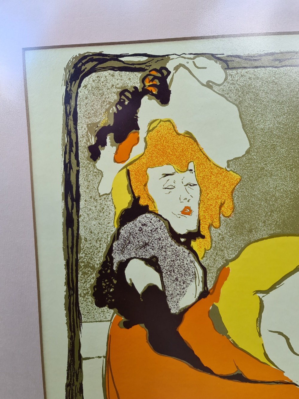 A framed vintage Art Nouveau poster featuring Jane Avril performing in an orange dress framed by a stylised double bass neck. View IV