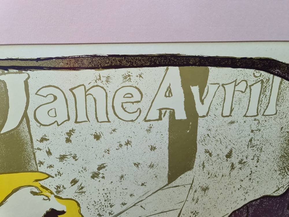 A framed vintage Art Nouveau poster featuring Jane Avril performing in an orange dress framed by a stylised double bass neck. View V