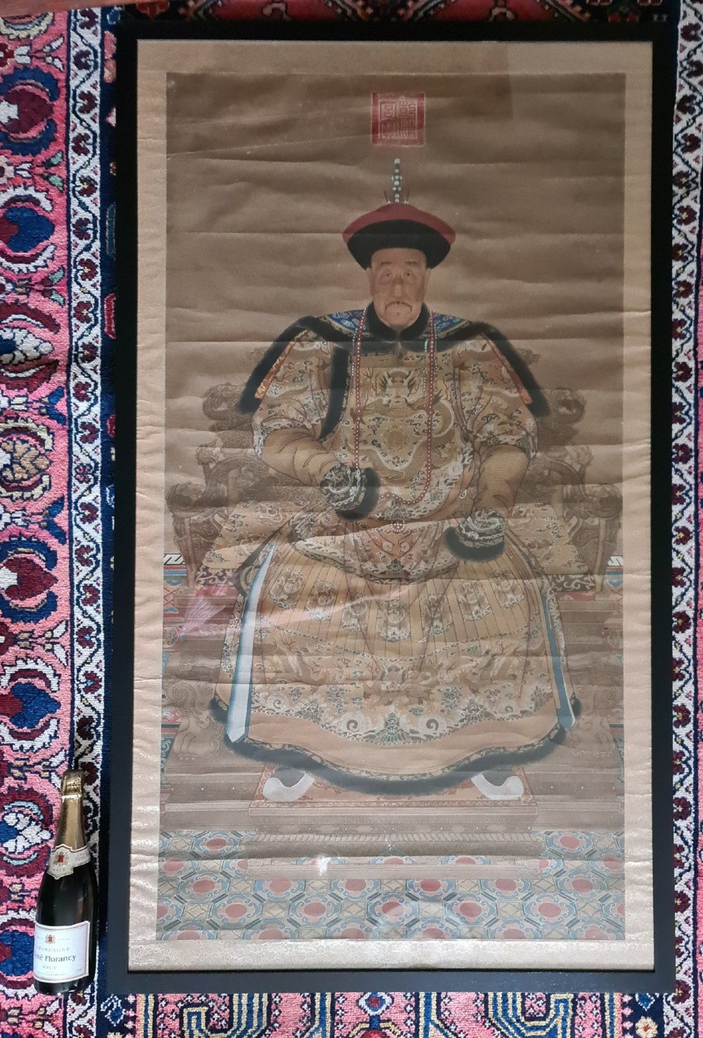 A large pair of framed Chinese ancestral portraits depicting a male and female figure in traditional formal court robes seated on ornate thrones. View III