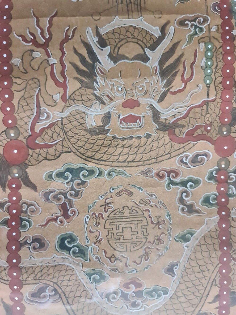 A large pair of framed Chinese ancestral portraits depicting a male and female figure in traditional formal court robes seated on ornate thrones. View V
