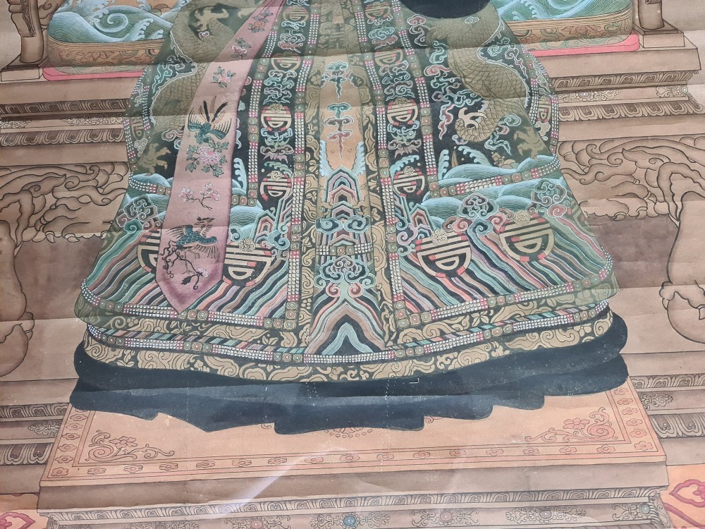 A large pair of framed Chinese ancestral portraits depicting a male and female figure in traditional formal court robes seated on ornate thrones. View IX