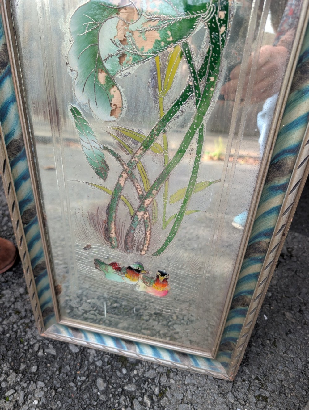 A pair of rectangular Chinese reverse-painted wall mirrors featuring floral, bird, and rooster illustrations against a distressed silvered glass background with striped frames. View V